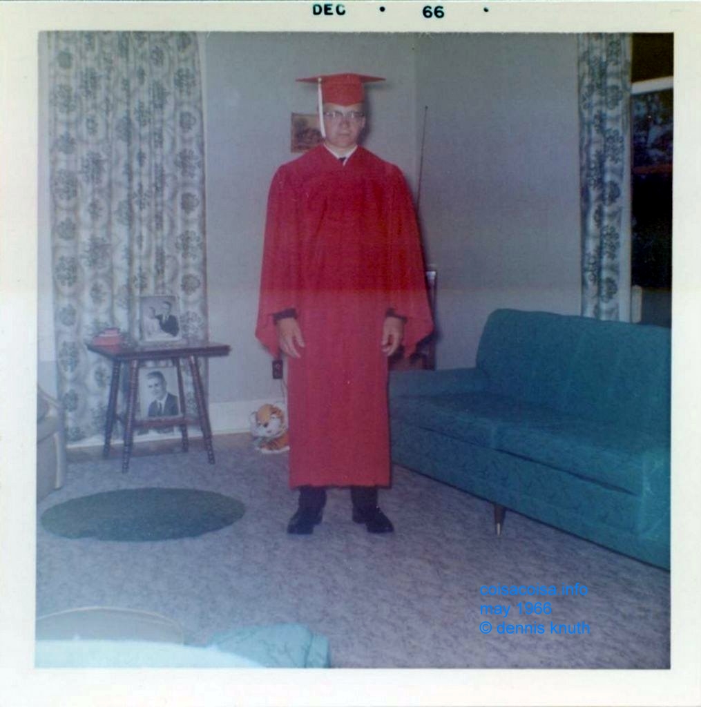 Dennis in his graduation gown