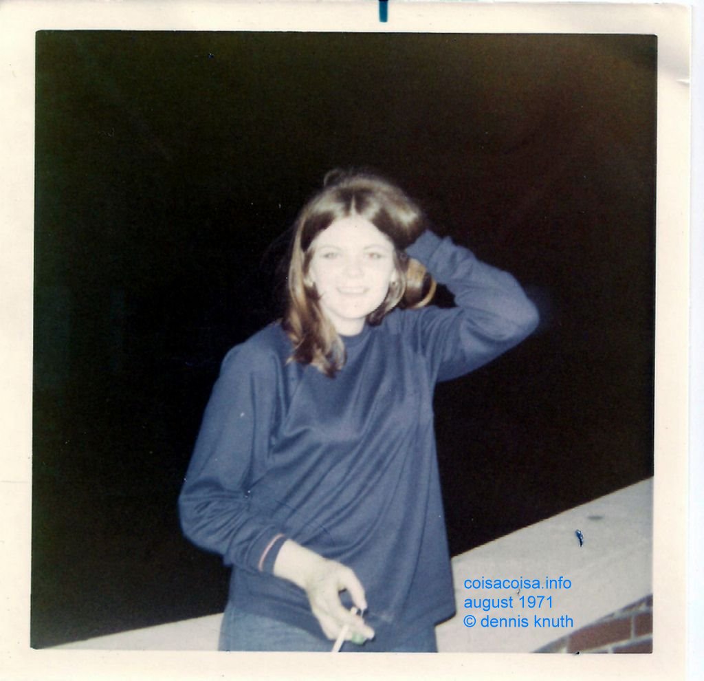 Lois Lee fluffing her hair