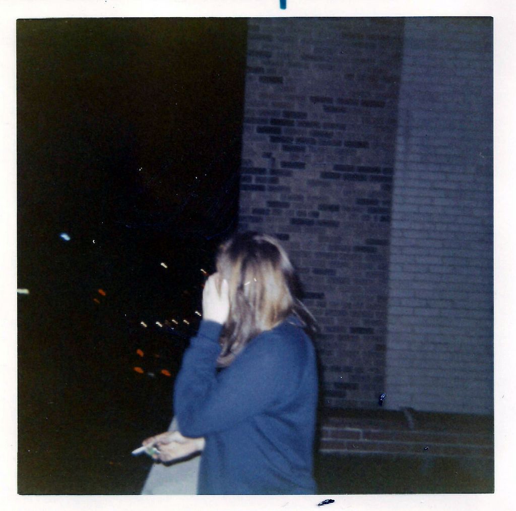 Lois Lee Looking out the balconey