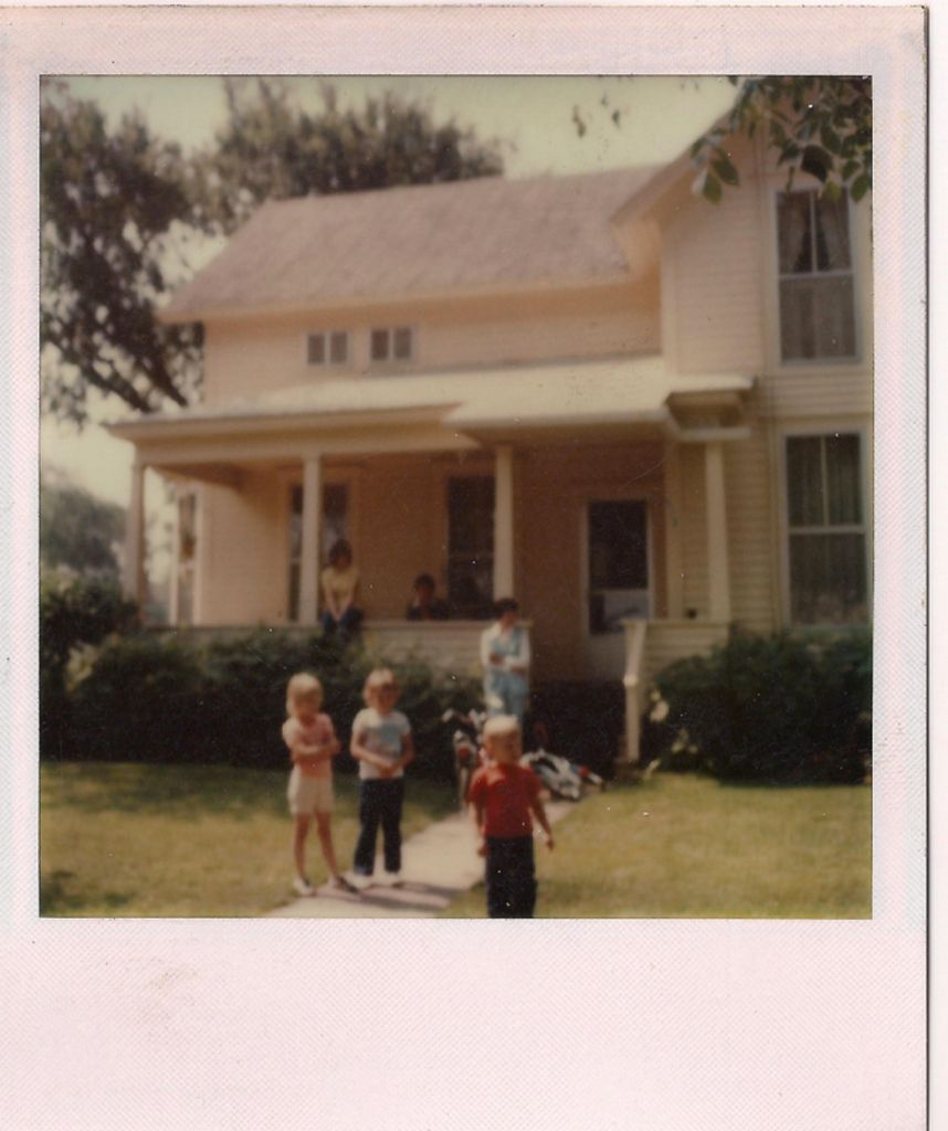Michelle Debbie and Scott on the lawn