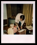 Dad Tom shows Debbie How to Play