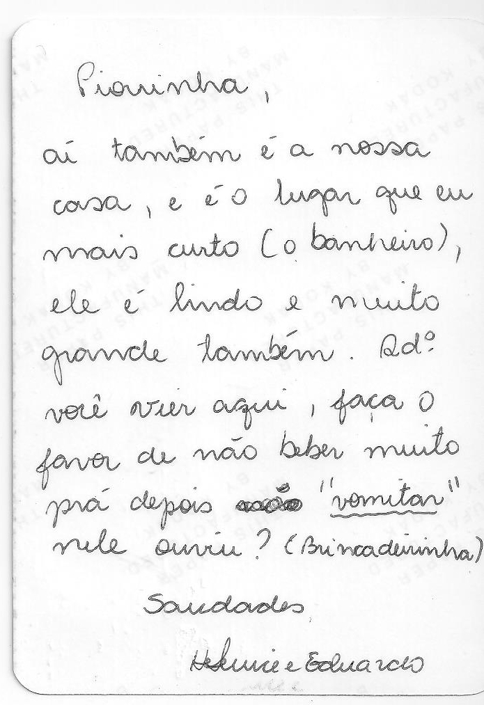 Back of the photo of Helenice Watering the plants