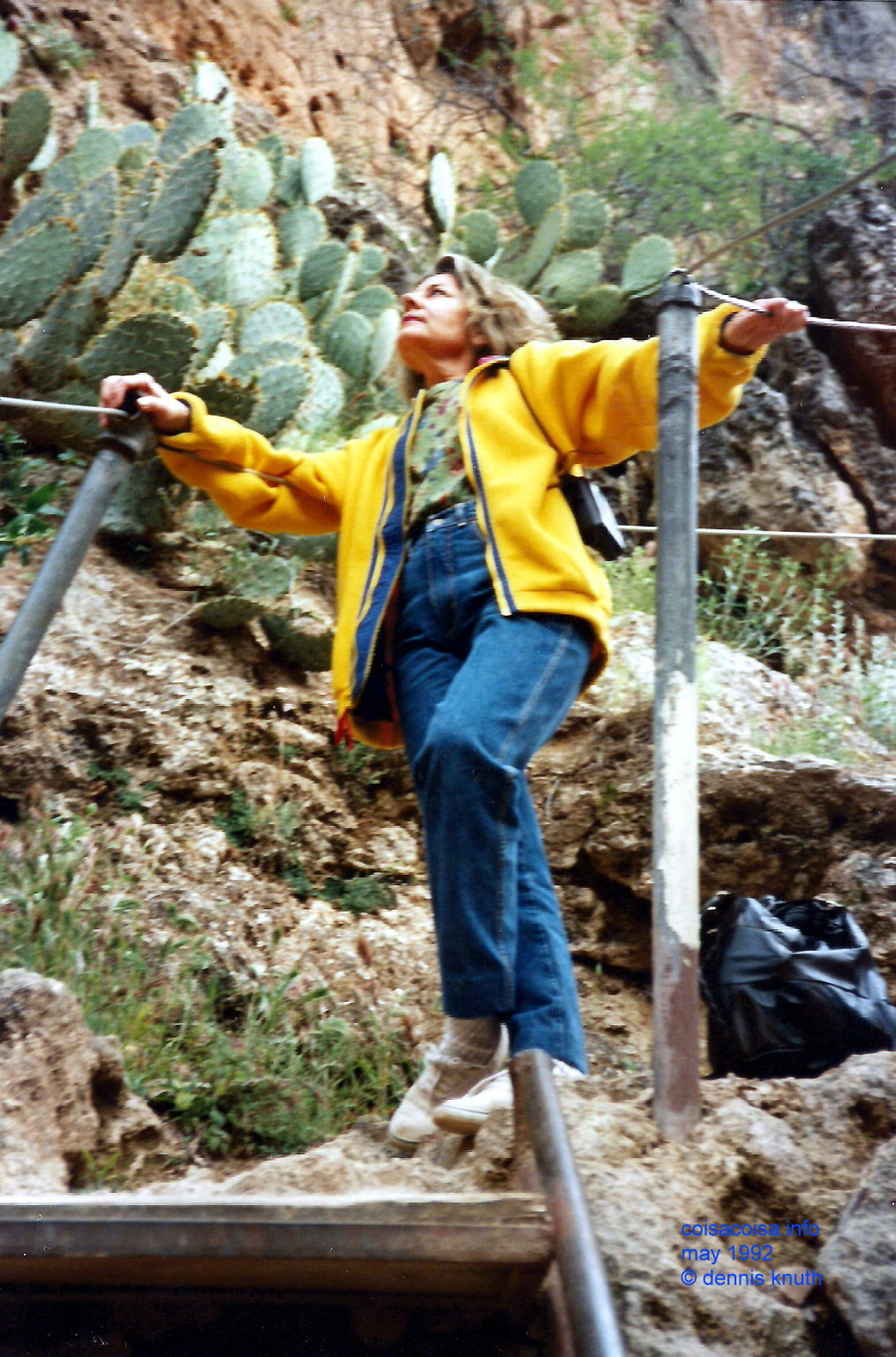 Sonja climbs a stairs in Fish Canyon