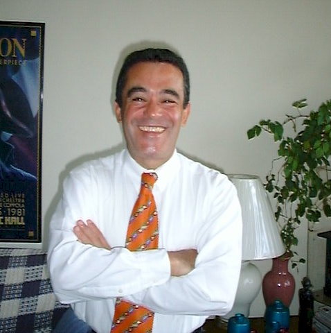 Helton Smiles in his white shirt