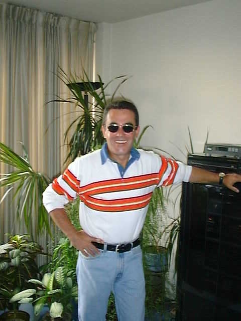 Helton posing in Sunglasses