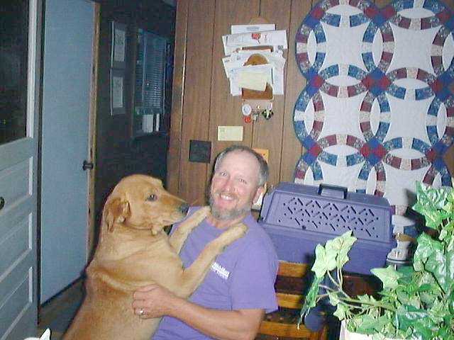Toby with his owner Gary on the farm