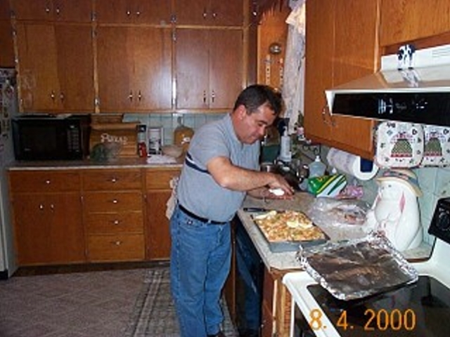 Helton cooks in the old kitchen