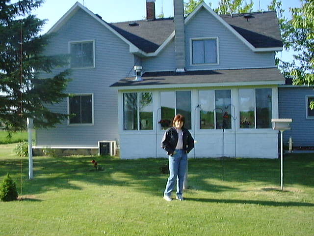 Dairy Farm House with Rose in Front
