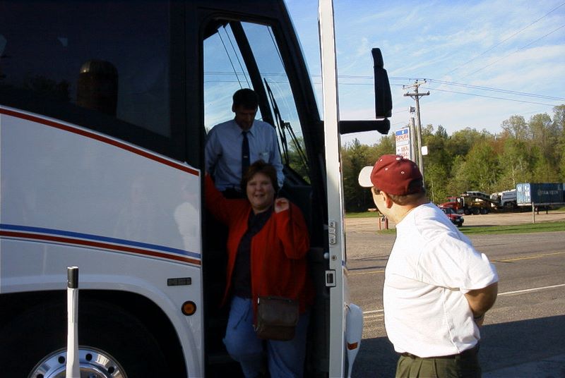 Debbie gets off the bus