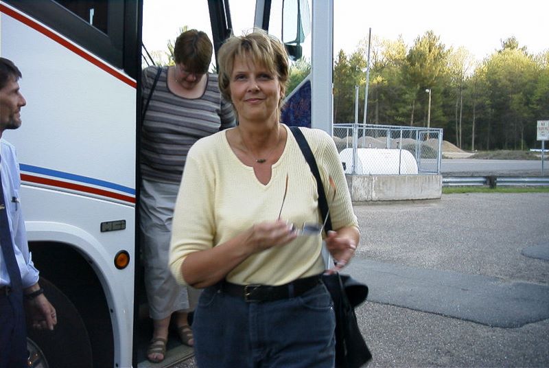 Who is this person exiting the bus