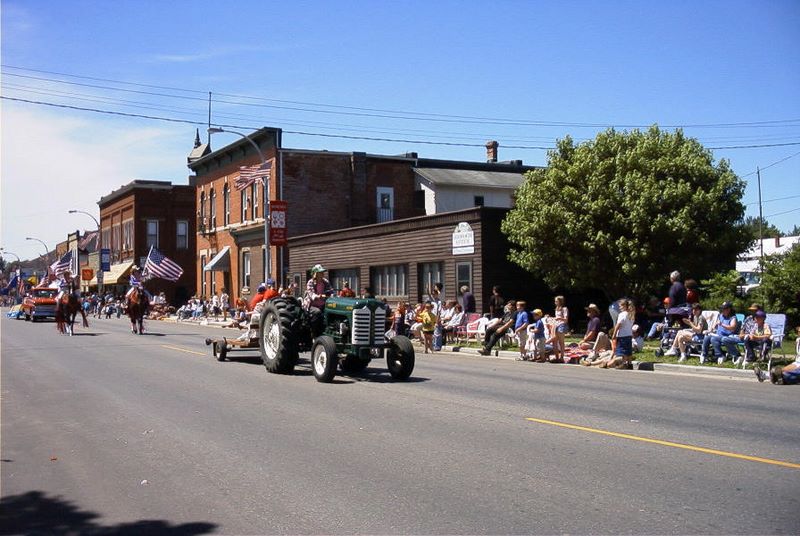 Tractor pulls a float