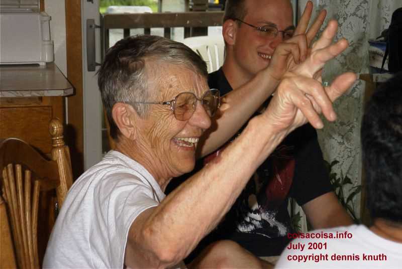 Emogene and Nathan gesture peace