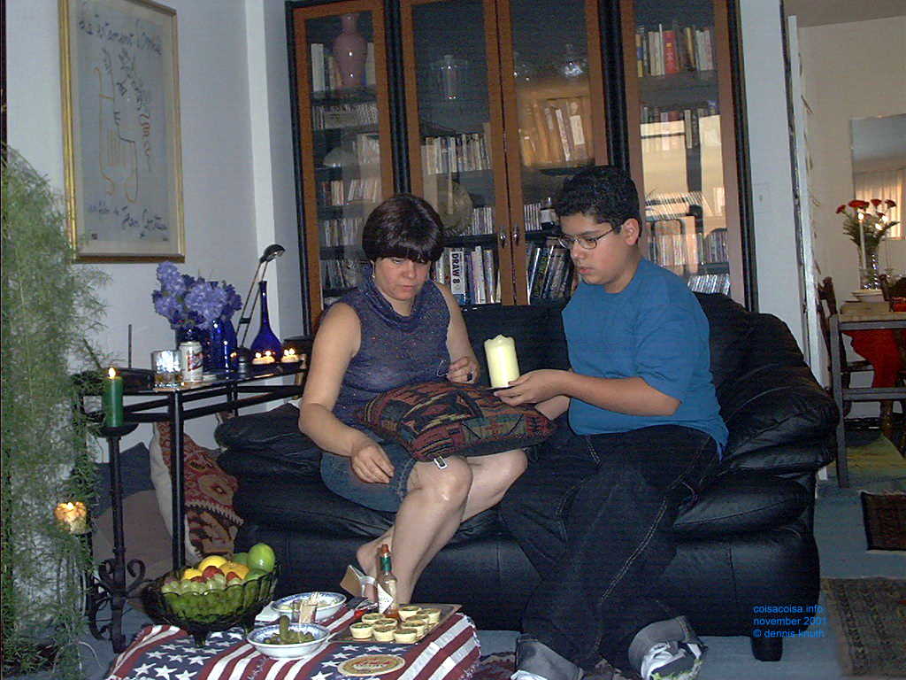 Helenice and Raphael light a candle