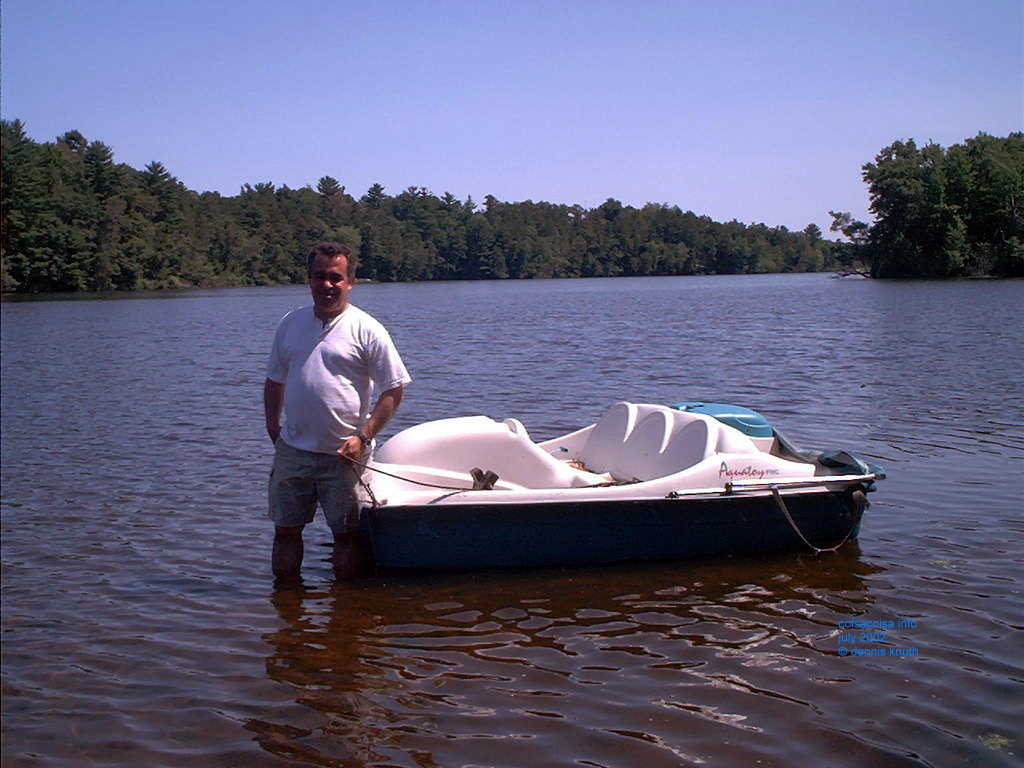 The Dells Pond in Augusta Wisconsin with Helton wading