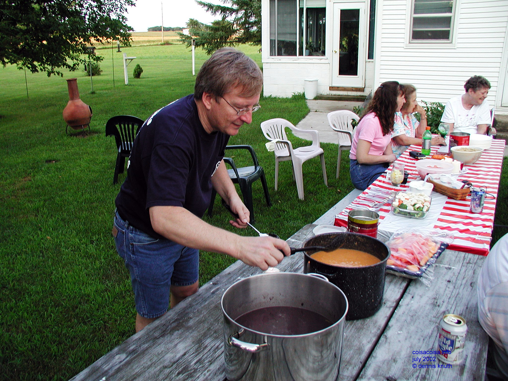 Dennis Depaulo serves the beans