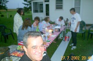 Helton smiles when people enjoy his food