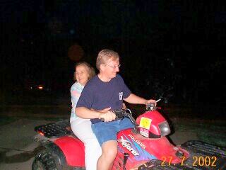 Dennis and aunt Doris on the three wheeler