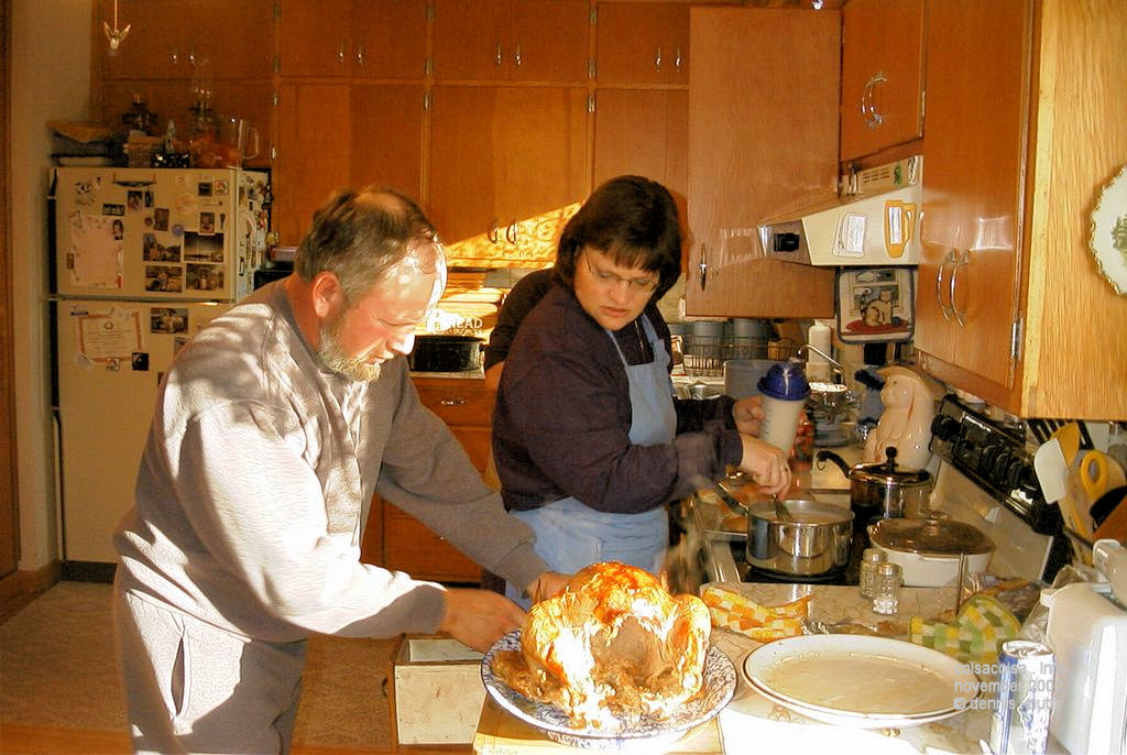 Gary and  Sherri Carve the Bird