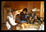 Gary and  Sherri Carve the Bird