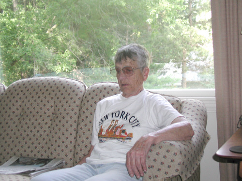 Emogene Reta Grams on the sofa