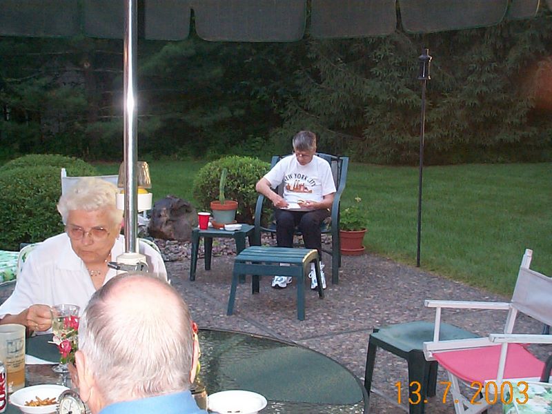 Emogene eats her sandwich