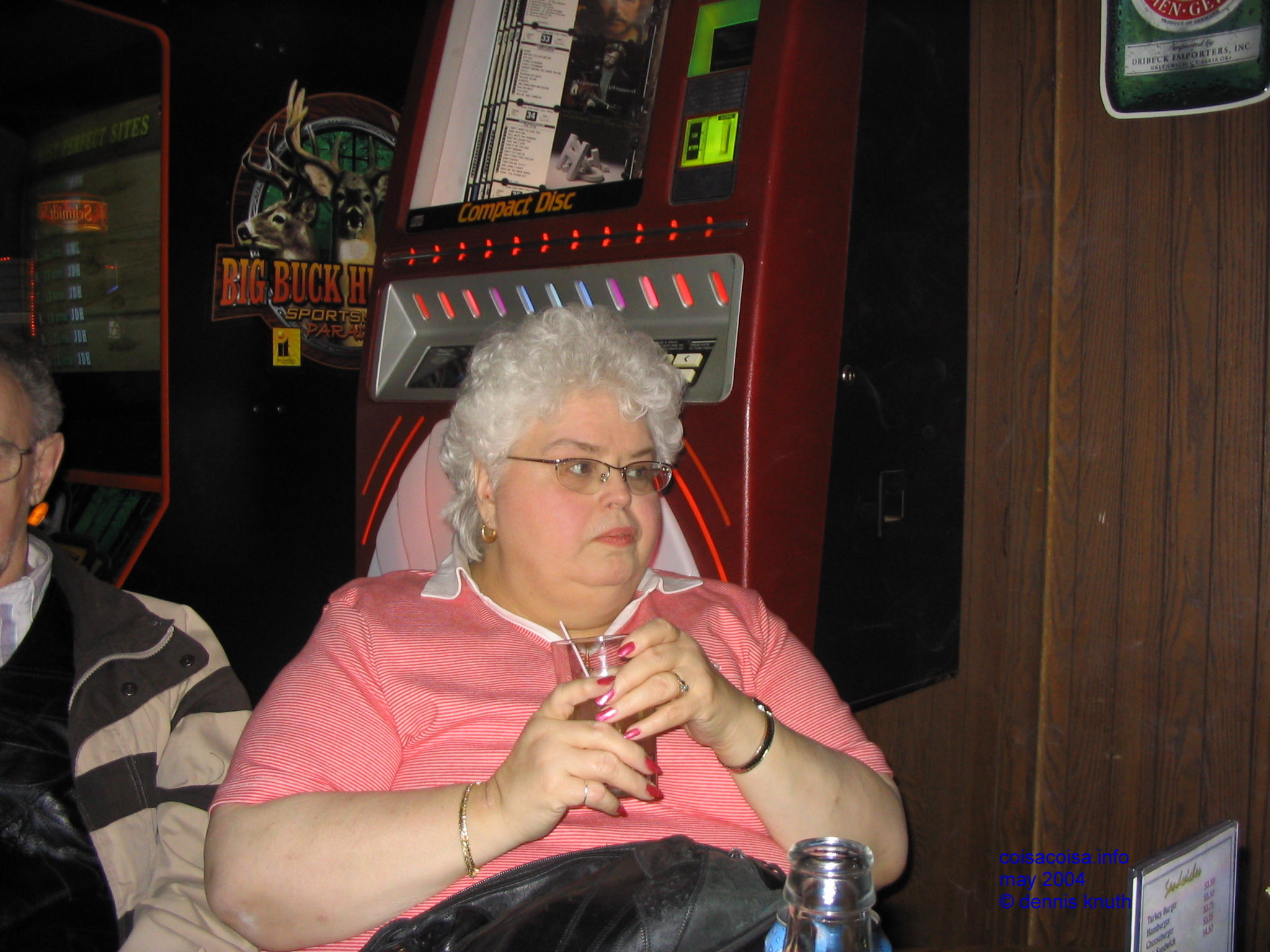 Gloria sips a Manhattan at the rehearsal party