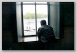 Helton looks out the window upon the Chippewa River