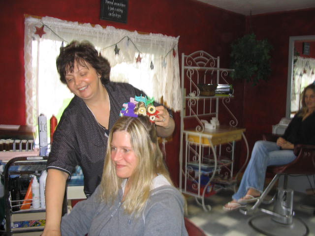 Rosie gets ready to set the hair of the bride to be