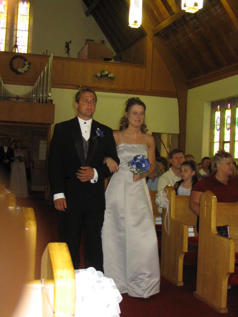 Groomsmand and bride maid at the enter procession
