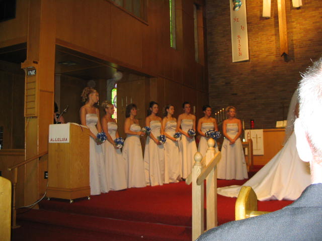 Bridesmaids watch love in progress