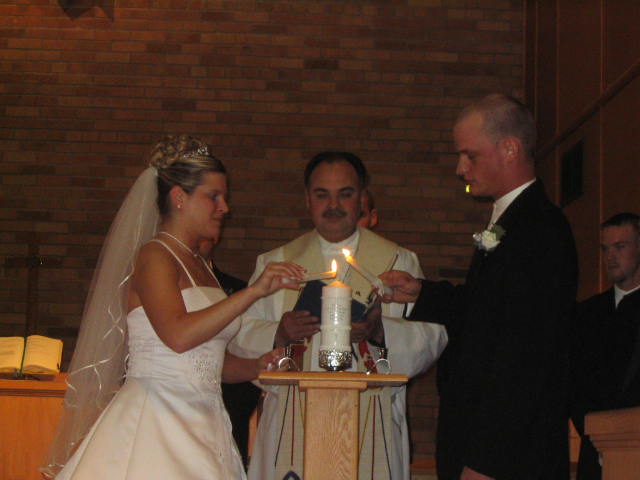 Nathan and Kelly light the candle of love