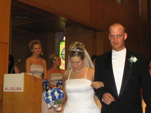 The new Mr and Mrs exit the altar