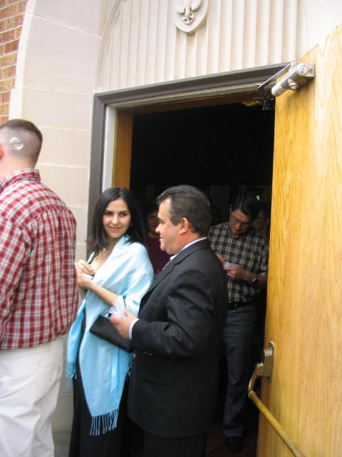 Helton and Silesia wait to greet the newly weds