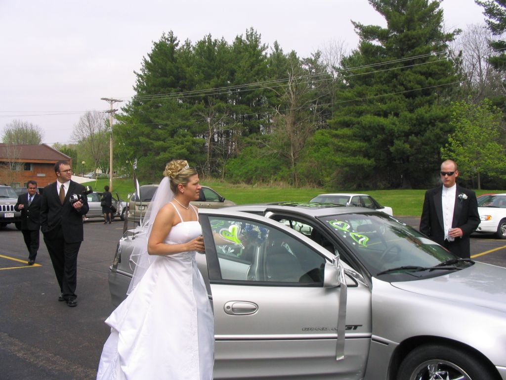Kelly gets into the car