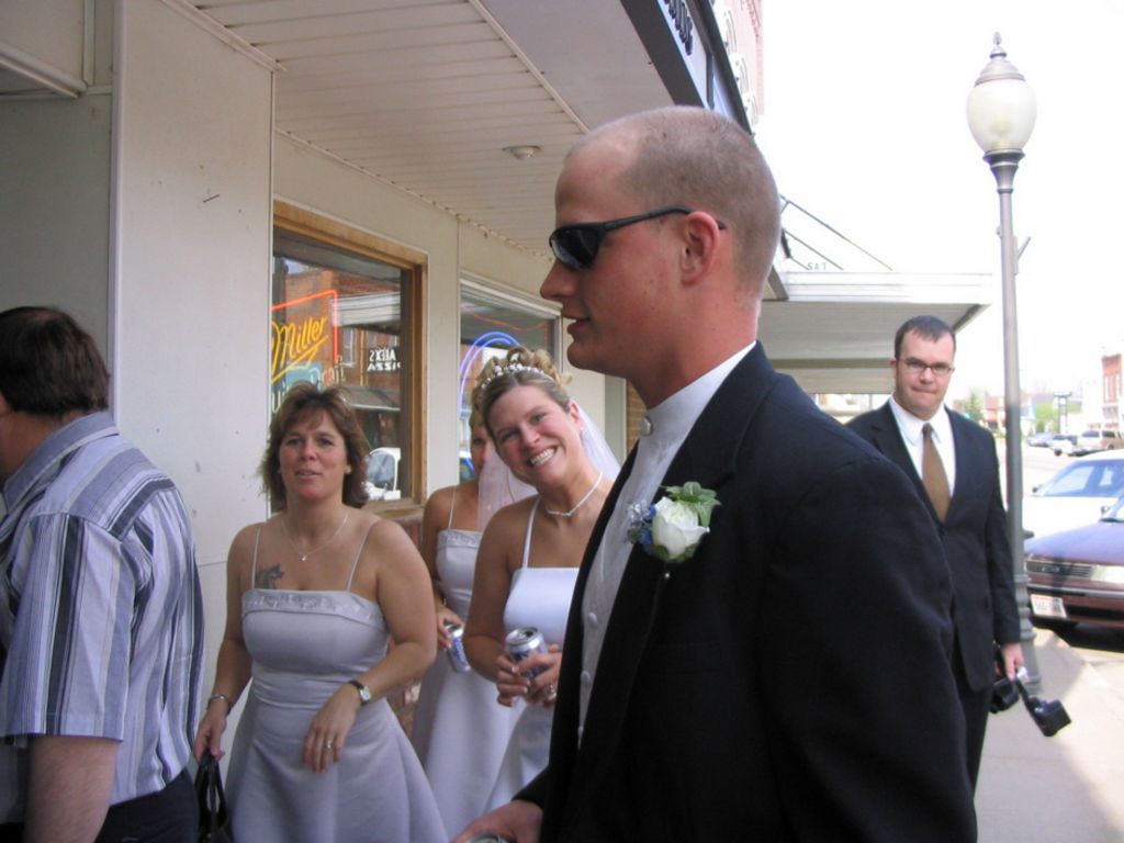 Nathan Kelly and the maid of honor enter the tavern