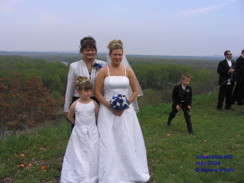 The bride, mother and daughter at the reception