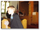 The ring bearer enters the church