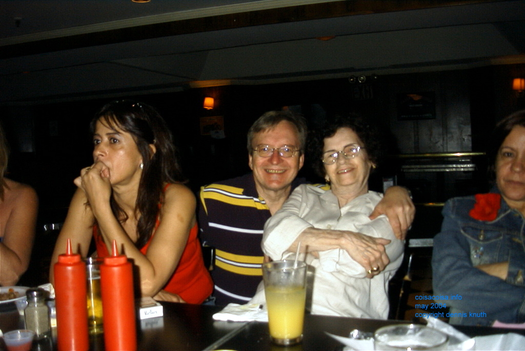 Dennis hugs Teresa and Lore