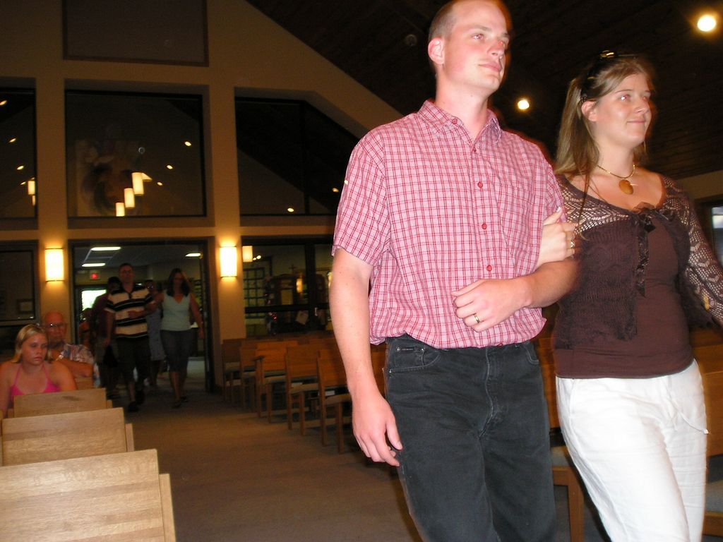 Nathan approaches the altar with his bridesmaid
