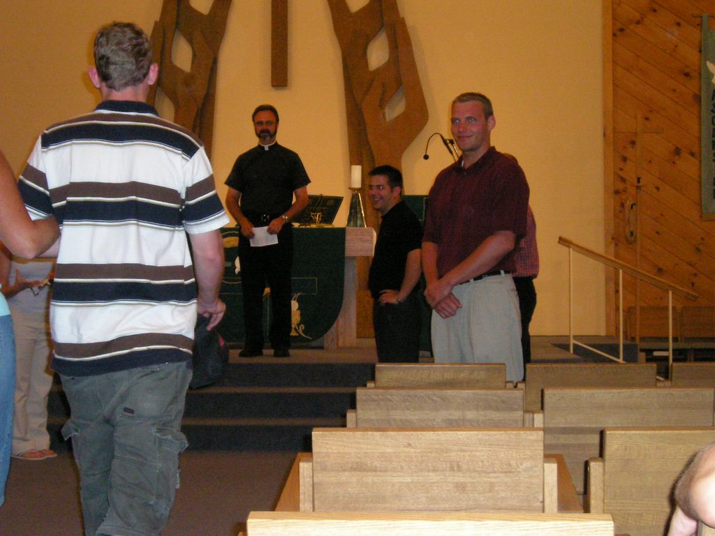 Matt Anderson and Bridesmaid approach the altar