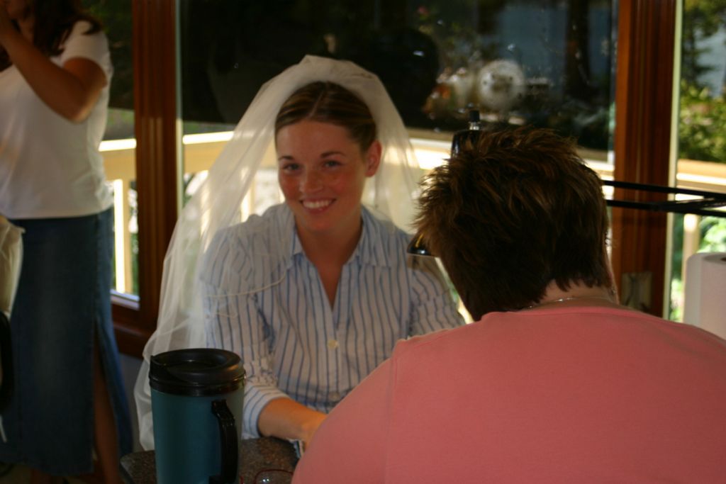 Julia wears her bridal veil
