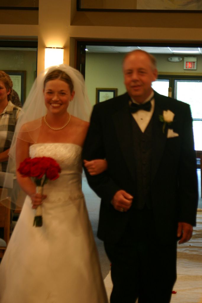 Julia and her father enter the Church