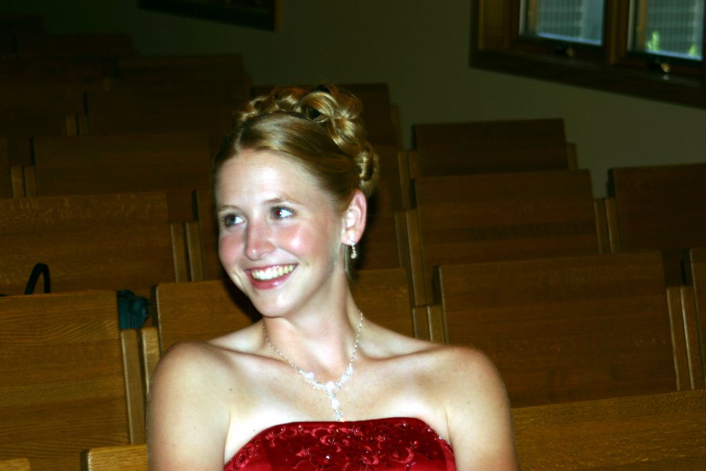 Julia's bridesmaid waits for the professional photographer