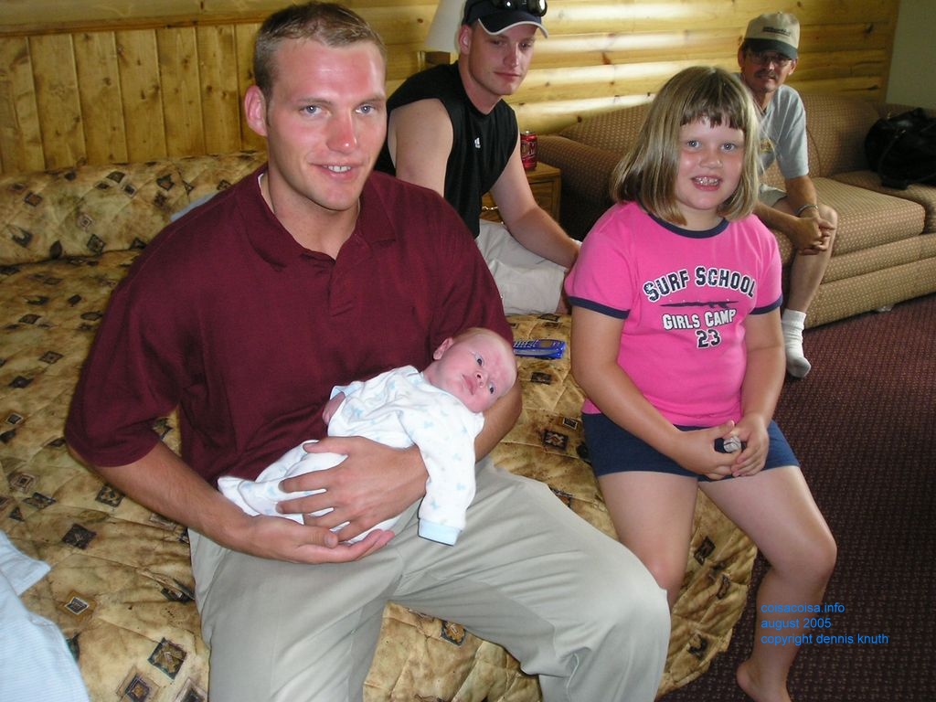 Uncle Justin and the two week old Jared
