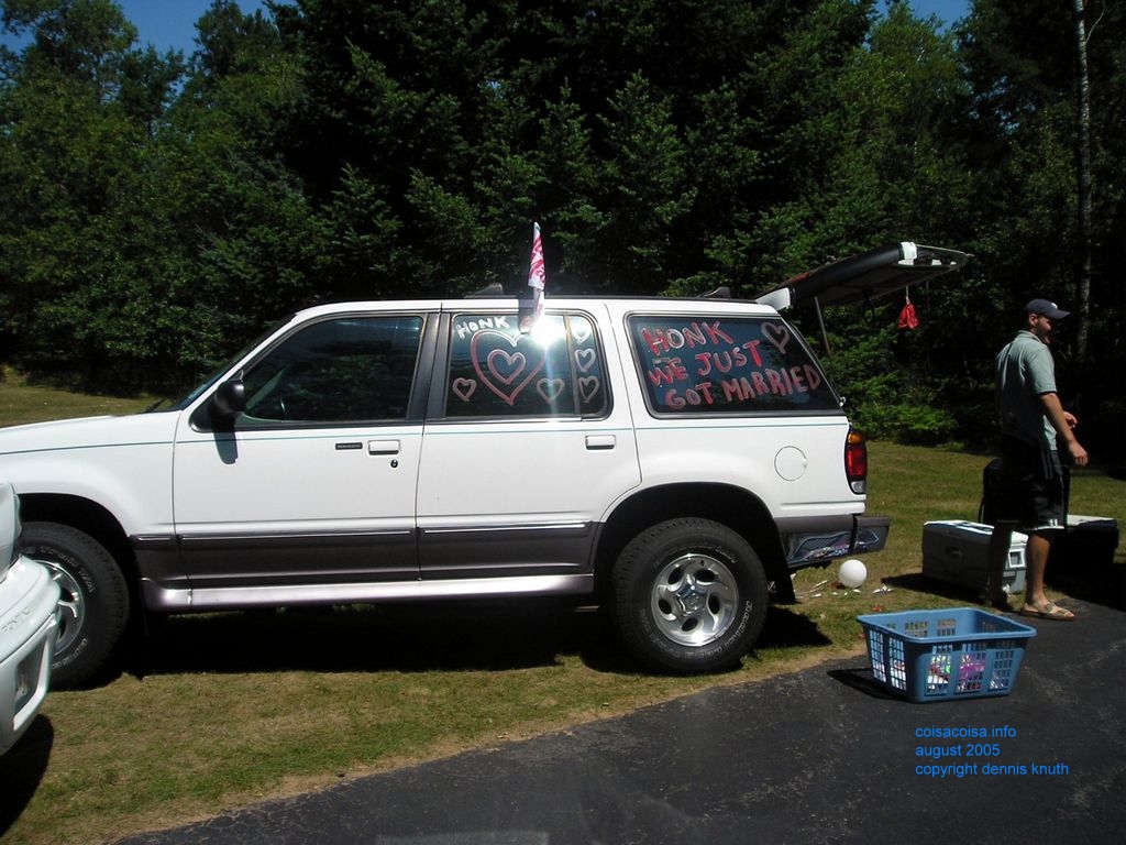 Justin loads up the honeymoon get away car