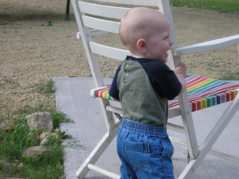 Jared Moore supports himself on a folding chair