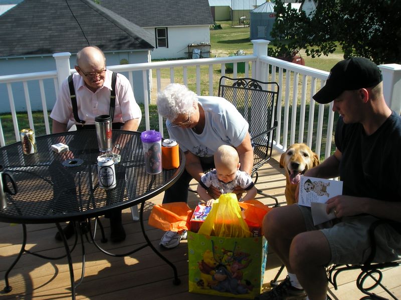 Great Grand Parents John and Ardith give Jared gifts