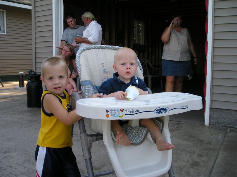 Cousin and Jared poised to get his birthday cake