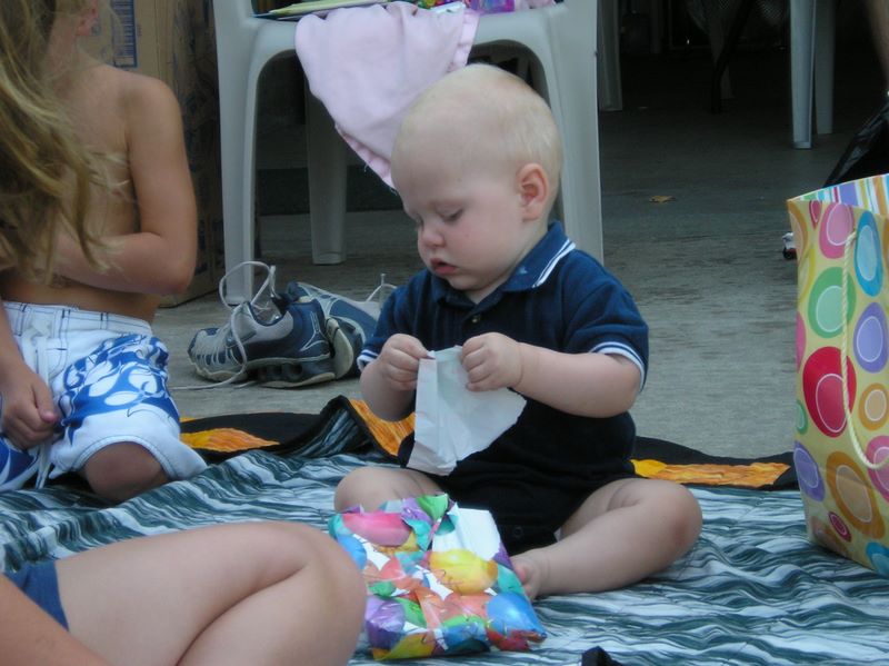 Jared opens one of his many gifts