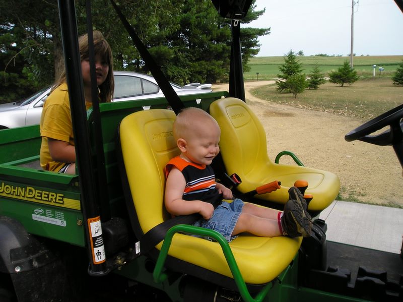 Laughing at his feet